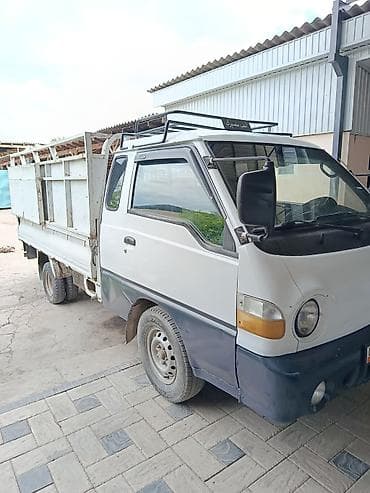 тез арада: Hyundai Porter: 2000 г., Кол менен иштөөчү — 3