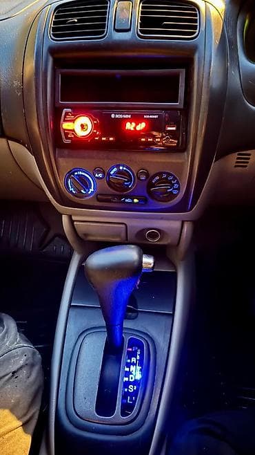 скупка мазда: Mazda Familia: 2002 г., 1.5 л, Автомат, Бензин, Универсал — 7