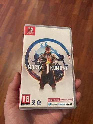 Техника и электроника: Mortal Kombat 1 — картридж для Nintendo Switch (европейская версия) — 1