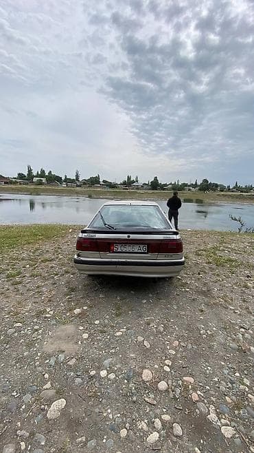 step wgn: Mazda 616: 1991 г., Механика, Бензин, Хэтчбэк — 10