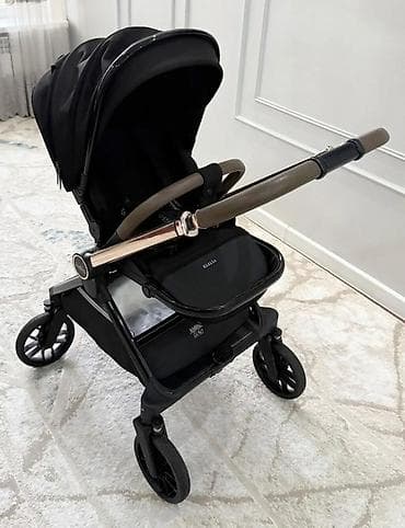 Прогулочная коляска Kidilo (надпись на сиденье) — стильная и