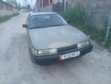 e90 bmw: Mazda 626: 1991 г., 2 л, Механика, Бензин, Лифтбек — 7