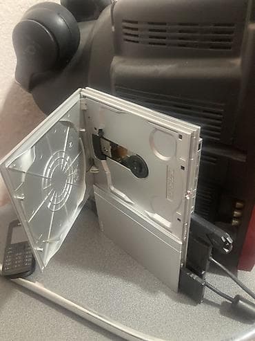 Игровая приставка Sony PlayStation 2 Slim (серебристая). Прошитая — 2