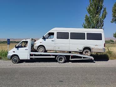 a 70: С жёсткой сцепкой, С частичной погрузкой, С лебедкой — 1