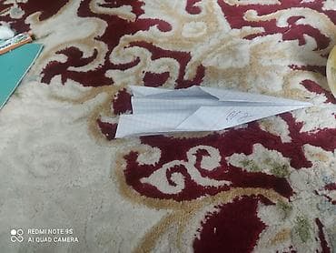 лис: Бумажный самолетик из тетрадного листа в клетку. - Ручная работа в — 1