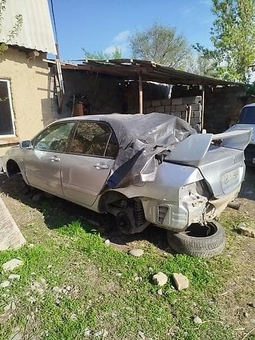 Разбор на запчасти — седан (серебристый), левый руль Доступно по