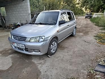 byd e2 2022: Mazda Demio: 2002 г., Механика, Бензин, Универсал — 6