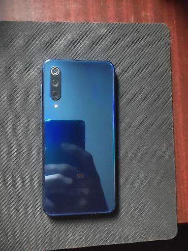 телефон 9с: Xiaomi, Mi 9 SE, Б/у, 128 ГБ, цвет - Синий, 2 SIM — 2
