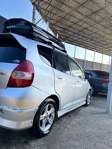 gac aion y: Honda Fit: 2001 г., 1.3 л, Вариатор, Бензин, Хэтчбэк — 4