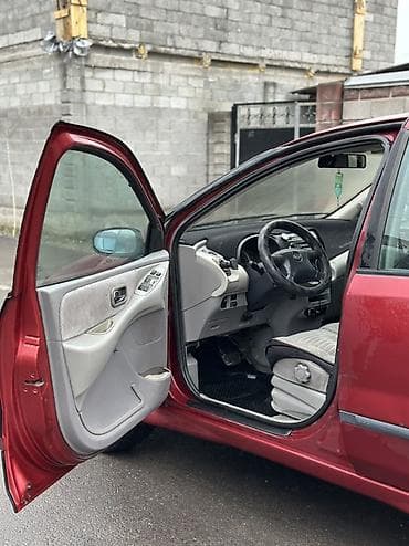 mini cooper: Nissan Almera Tino: 2000 г., 0.2 л, Автомат, Бензин, Минивэн — 3