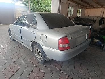 тойота bz4: Mazda 323: 2002 г., 1.6 л, Механика, Бензин, Седан — 4