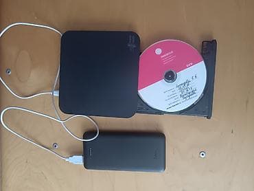 ТВ и видео: Внешний тонкий привод DVD-RW (USB) Модель: Hitachi-LG Data Storage — 5