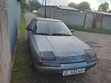 mitsubishi pojero: Mazda 323: 1994 г., Механика, Бензин — 1