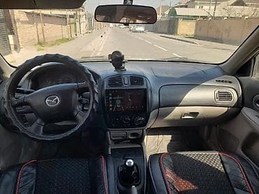 матор 102: Mazda 323: 2002 г., Ручные, Бензин, Универсал — 5