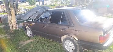 Mazda 323: 1985 г., 1.5 л, Механика, Бензин, Седан — 2