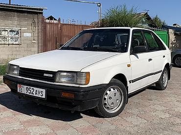 Mazda 323: 1987 г., 1.5 л, Механика, Бензин, Хэтчбэк — 1