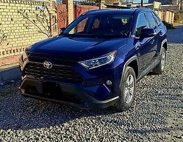 bwb e34: Toyota RAV4 Hybrid XLE (поколение XA50), темно‑синий кроссовер. не — 1