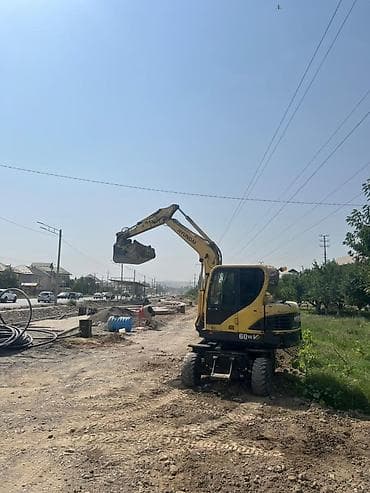 hyundai таракан: Экскаватор, Hyundai, 2011 г., Колесный — 5