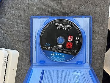 игры playstation 4: PlayStation 4 Slim (белая), комплект для игр - Консоль Sony — 5