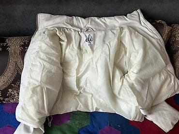 горнолыжную тёплую куртку: Укороченная женская куртка-пуховик цвета айвори (молочный). - Верх — 3