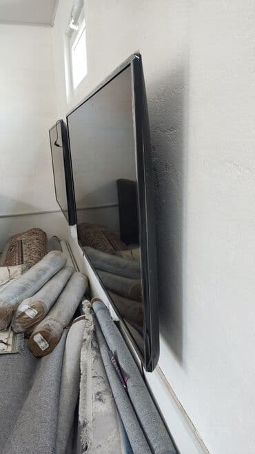 кронштейн для крепления телевизора: Телевизор LG с тонкой черной рамкой, предназначенный для настенного — 2