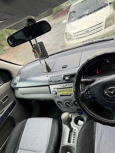 odyssey absolute: Mazda Demio: 2003 г., 1.3 л, Автомат, Бензин, Хэтчбэк — 6