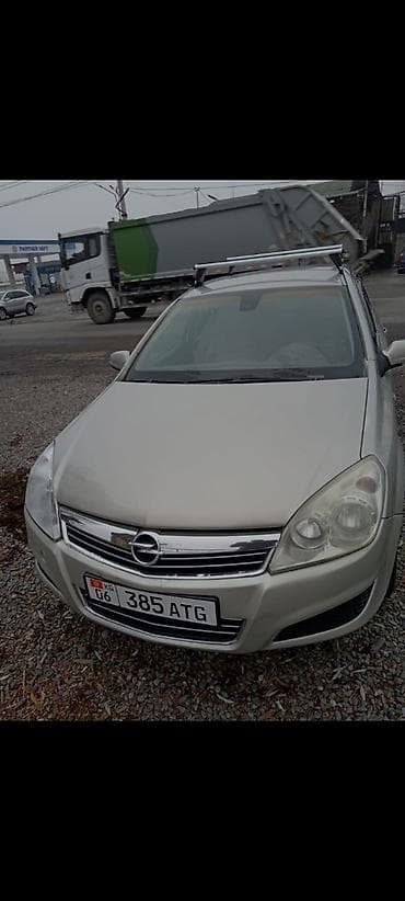 люк бмв е34: Opel Astra: 2009 г., Универсал — 4