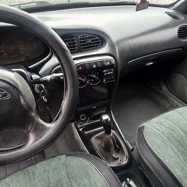 honda prilud: Hyundai Avante: 1998 г., Седан — 8