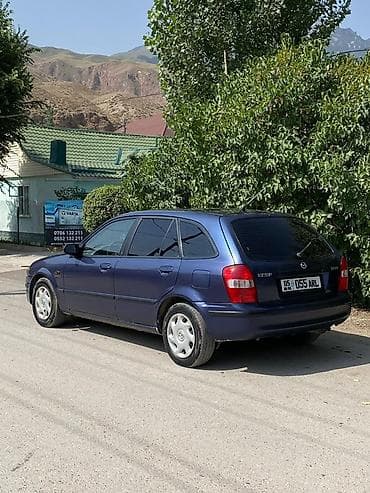 2000: Mazda 323: 2000 г., Хэтчбэк — 3
