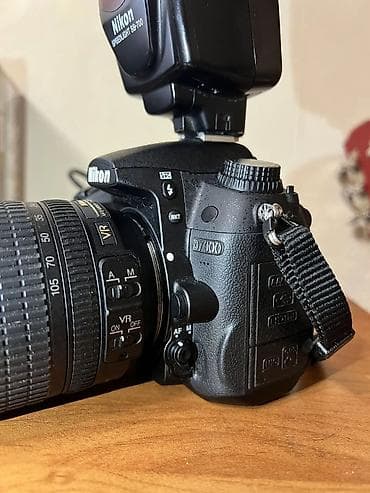 Фото жана видеокамералар: Зеркальная фотокамера Nikon D7000 с универсальным зум-объективом и — 5