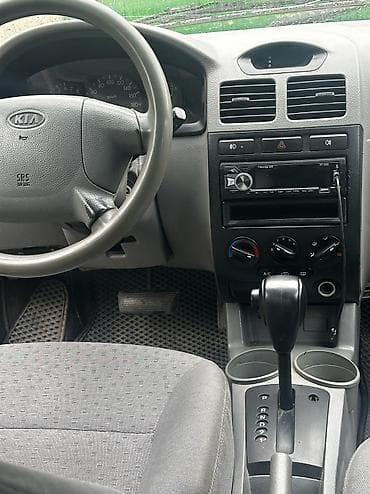 кызыл кия кыз: Kia Rio: 2003 г., 1.5 л, Автомат, Бензин, Универсал — 5