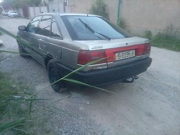 e90 bmw: Mazda 626: 1991 г., 2 л, Механика, Бензин, Лифтбек — 5