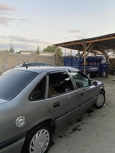 70 сом: Opel Vectra: 1995 г. — 4