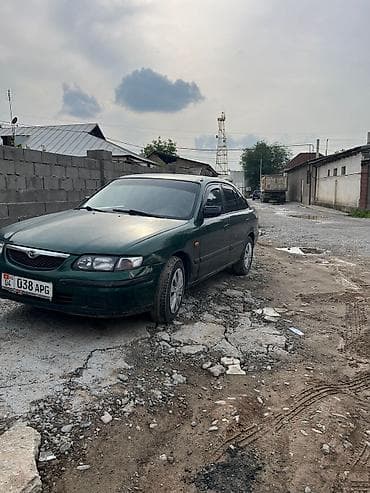 kia stringer: Mazda 626: 1998 г., 2 л, Автомат, Бензин, Седан — 4