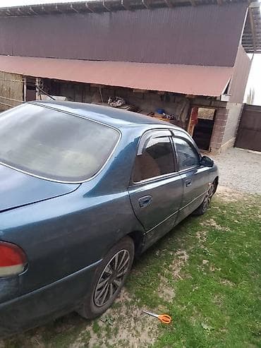 ош ишкаван: Mazda Cronos: 1993 г., 2 л, Кол менен иштөөчү, Бензин, Седан — 2