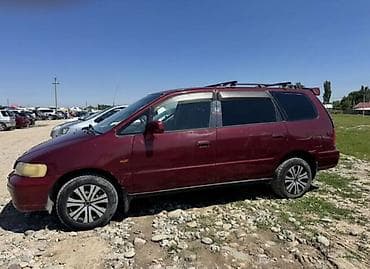 салон автомобиля: Honda Odyssey: 1995 г., 2.3 л, Автомат, Бензин, Минивэн — 2
