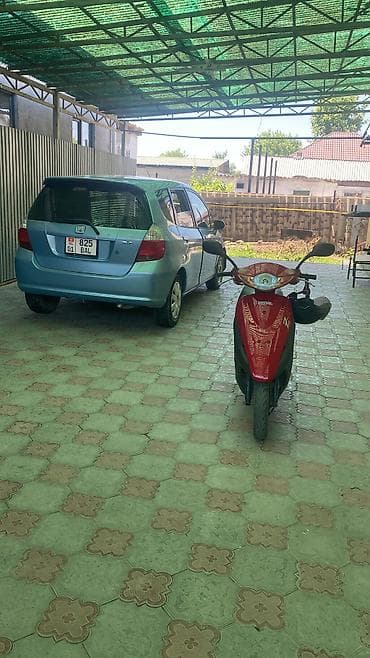 вазы хрустальные: Honda Fit: 2002 г., Бензин — 1