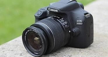 k 50: Зеркальная камера Canon EOS 2000D с объективом Canon EF‑S 18–55mm — 2