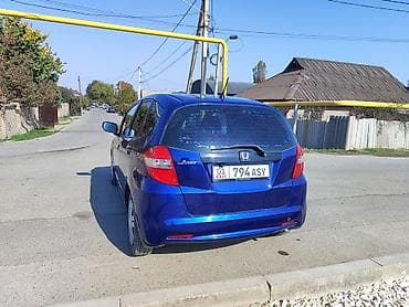 golf v: Honda Jazz: 2011 г., 1.3 л — 5