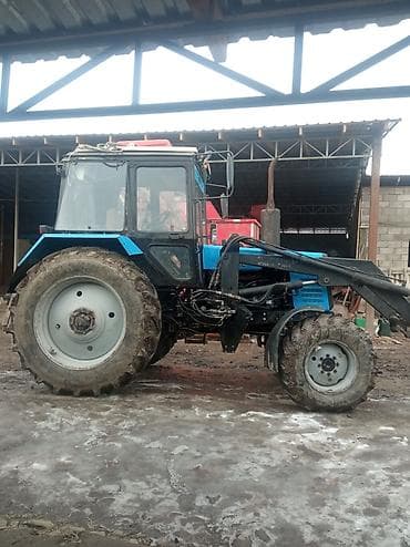 Трактор Беларус МТЗ-1025 с передним погрузчиком кун быстросём джойстик