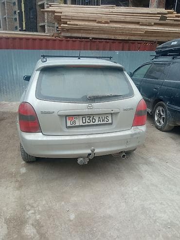 mini car: Mazda Familia: 2003 г., Универсал — 5