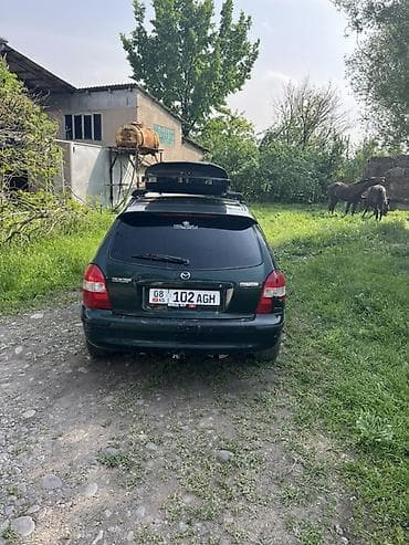 mazda 626 2001: Mazda 323: 1999 г., 1.8 л, Механика, Бензин, Универсал — 2