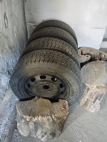 падиомник авто: Комплект зимних колёс на штампованных дисках. - Шины: Dunlop — 2