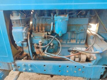 продаю в связи с переездом: Трактор колесный синего цвета с прицепом. Телешкасы менен сатылат — 13