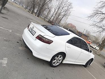 тюнинг салона: Автомобиль – седан, салон серо‑бежевый, тканевая обивка. Особенности — 9