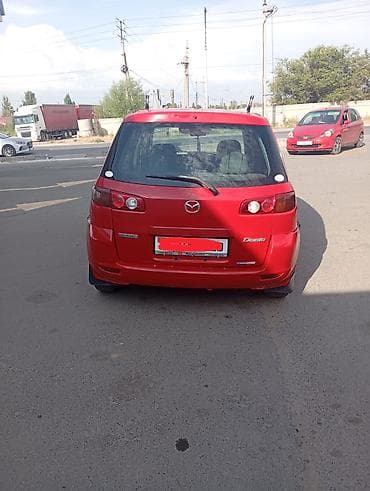 Mazda Demio: 2003 г., 1.5 л, Автомат, Бензин, Хэтчбэк