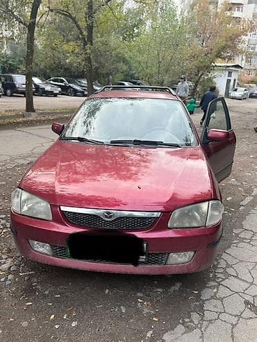 Mazda 323: 2000 г.