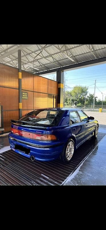 colf 2: Mazda Familia: 1992 г., Бензин, Хэтчбэк — 3