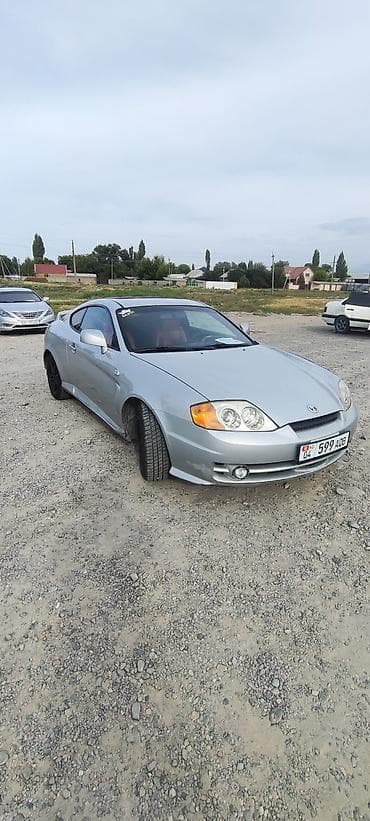tuscani: Hyundai Tuscani: 2002 г., 2 л, Механика, Бензин, Купе — 10
