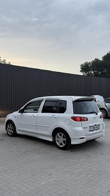 mazda 323 универсал: Mazda Demio: 2003 г., 1.3 л, Автомат, Бензин, Хэтчбэк — 5